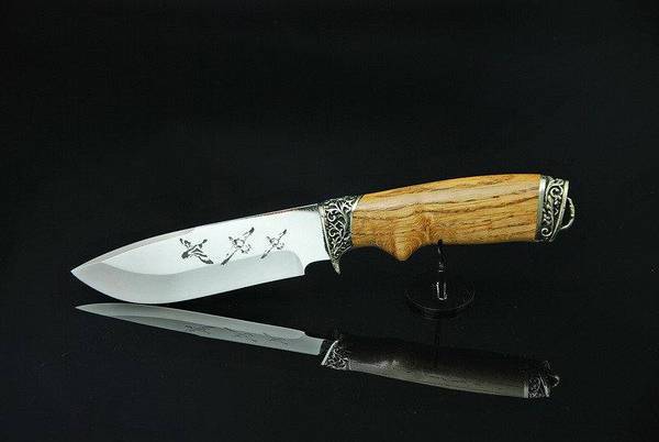 Лазерная гравировка на охотничьи ножи