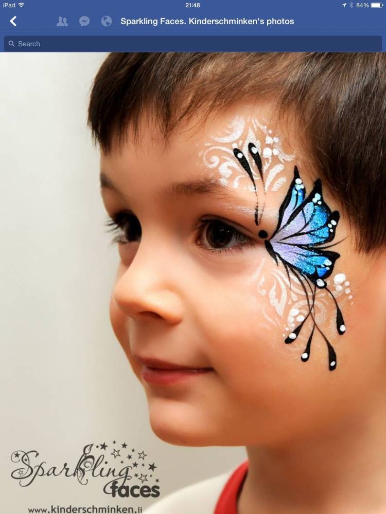 Рисунок на лице бабочка